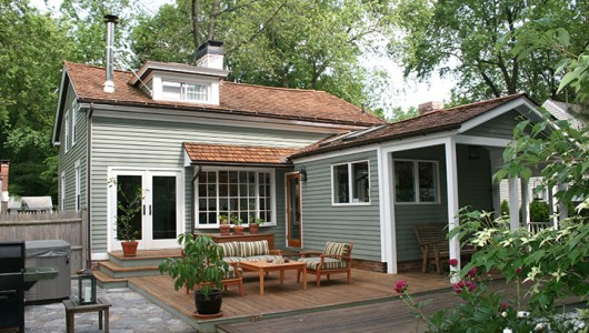 Here is the deck 7 months after the strip job. It is now June. When we did the roof we did a deck maintenance which is just to pressure clean it off and apply a light coat of oil.