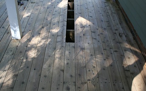 A cedar plank had to be replaced because it was rotted.