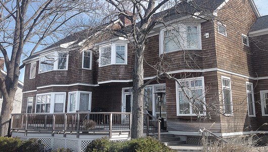 Photo of cedar house before the restoration process.