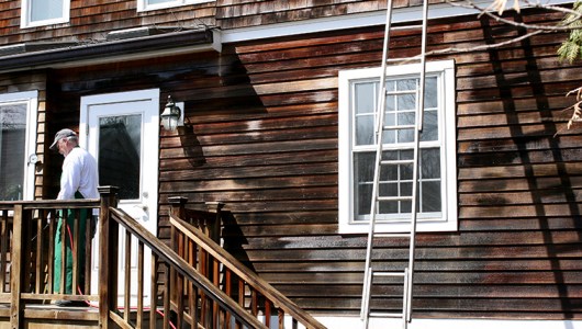 Chemical solution applied to cedar clapboards during the cleaning process.